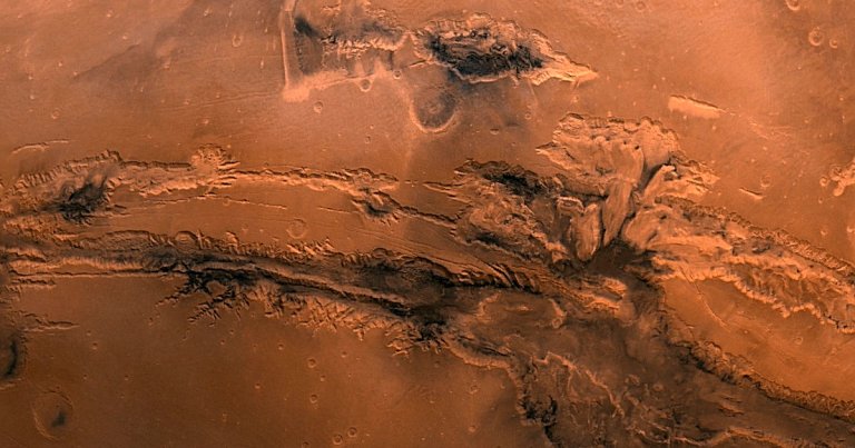 With the help of the European Space Agency's ExoMars Trace Gas Orbiter, scientists discovered a huge deposit of water at the bottom of a Martian canyon.