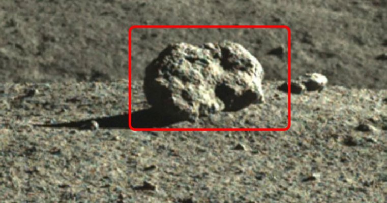Chinese Rover Exploring What Appears to Be Cube-Shaped Object on Moon