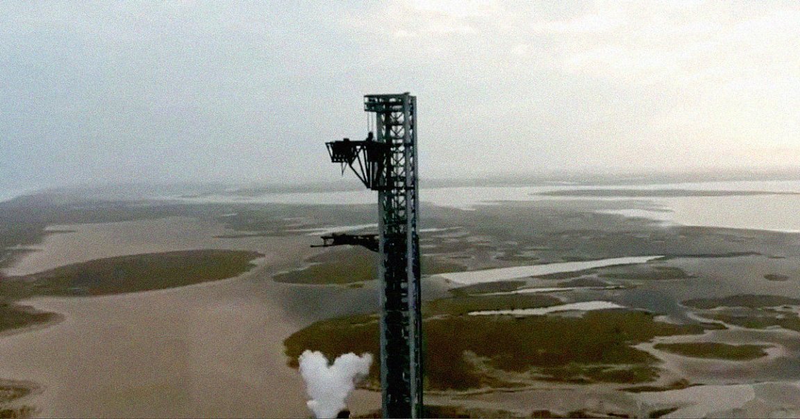 SpaceX has hooked up the pair of massive "chopsticks" of its 460-foot "Mechazilla" tower to its latest Starship prototype dubbed Ship 20.