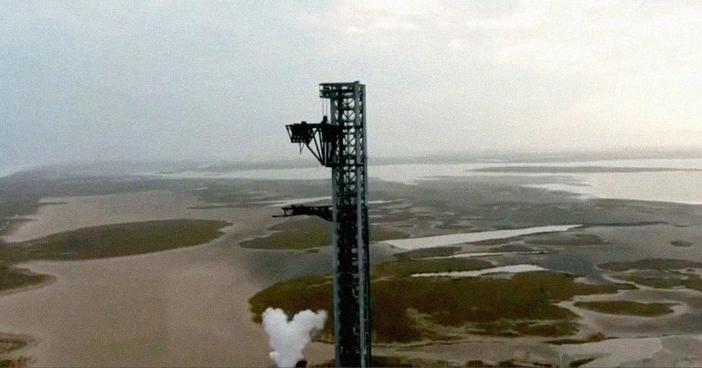 SpaceX has hooked up the pair of massive "chopsticks" of its 460-foot "Mechazilla" tower to its latest Starship prototype dubbed Ship 20.