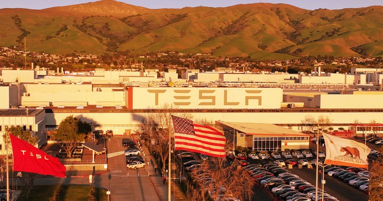 The billionaire said he wouldn't stop the United Auto Workers from holding a vote on whether employees should unionize at one of Tesla's factories.