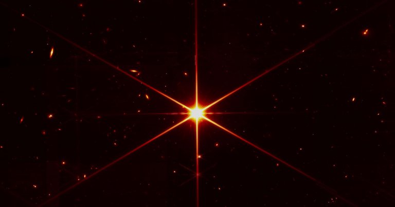 NASA has released a stunning new image taken by its James Webb Space Telescope that shows a star fully in focus surrounded by a dizzying vista of galaxies.