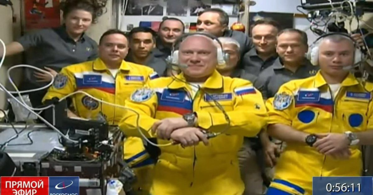 Three Russian cosmonauts boarded the International Space Station wearing blue and yellow space suits that looked like the colors of the Ukraine flag.