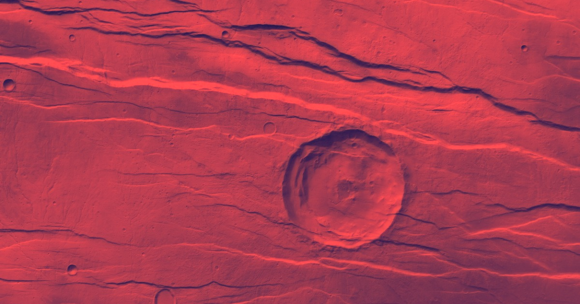 The European Space Agency posted new photos of Mars' topography captured by the Mars Express. The depressions look like "fingernail" scratches.