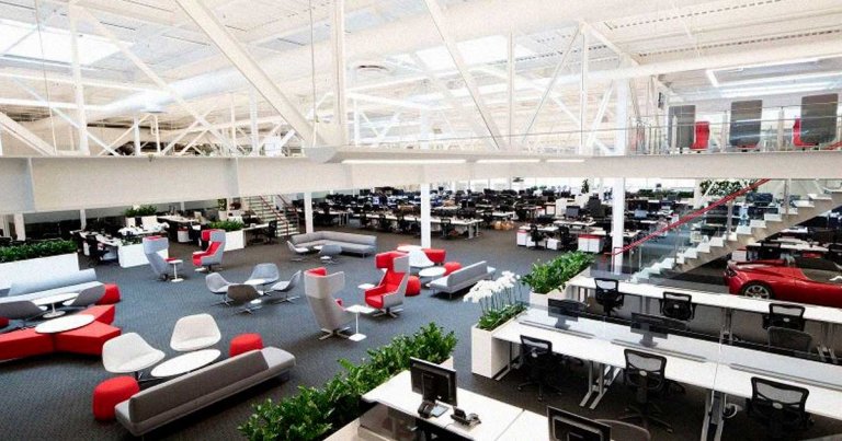 Tesla's offices are literally not equipped to handle the recent influx of workers, with parking spots and desks becoming difficult to come by.