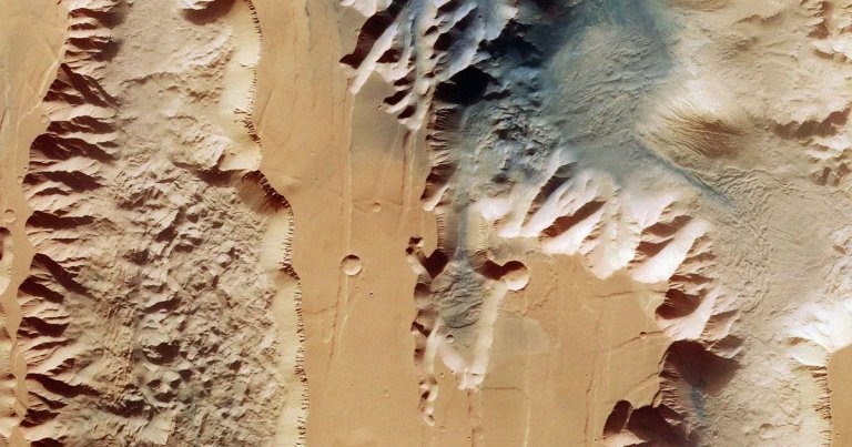 New imagery of the largest canyon in the solar system was captured on the Red Planet by the ESA and the Mars Express mission.