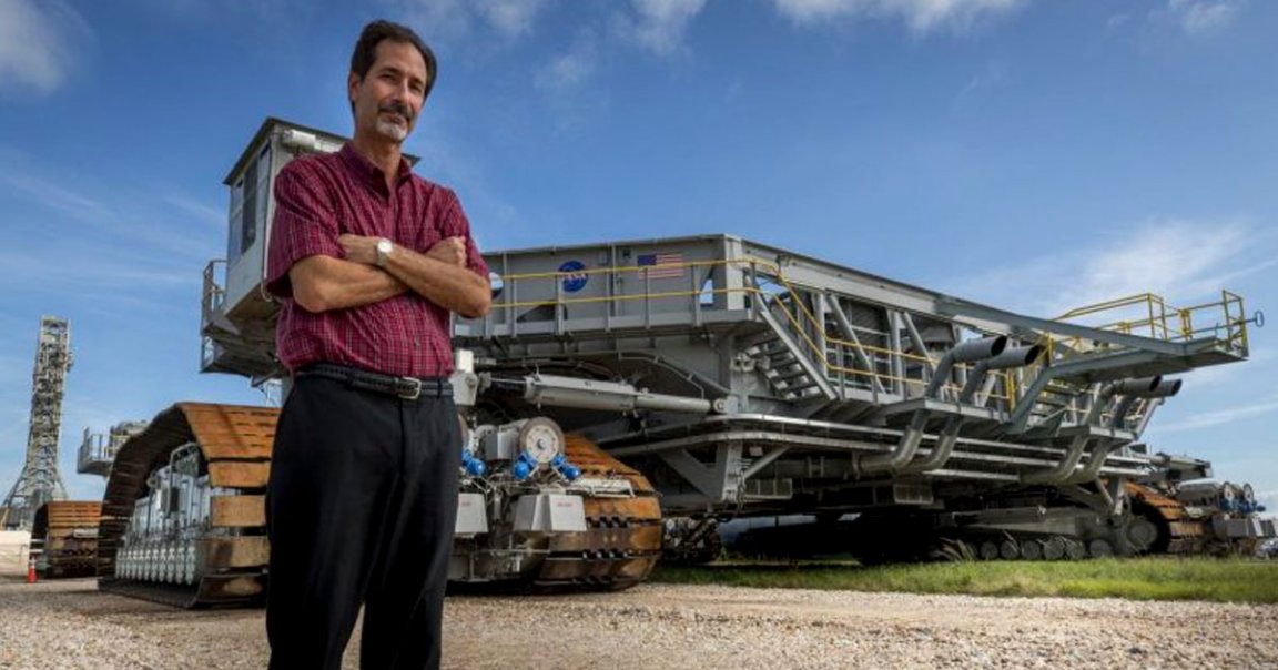 Moving a huge rocket is tough. John Giles, the man in charge of doing just that, is not happy at the prospect of a delay forcing his team to do it all over.