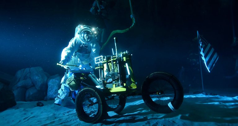NASA has turned its giant 6.2 million-gallon Neutral Buoyancy Laboratory (NBL) into a replica of the surface of the Moon to train astronauts.