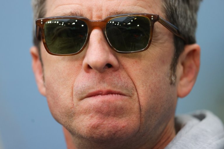 A second Gallagher brother has responded to an AI-generated Oasis album — and because one loved it, the other, of course, had to hate it.
