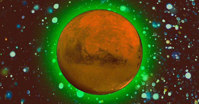 During a recent probe, the European Space Agency's ExoMars probe spotted the Red Planet glowing green at night.