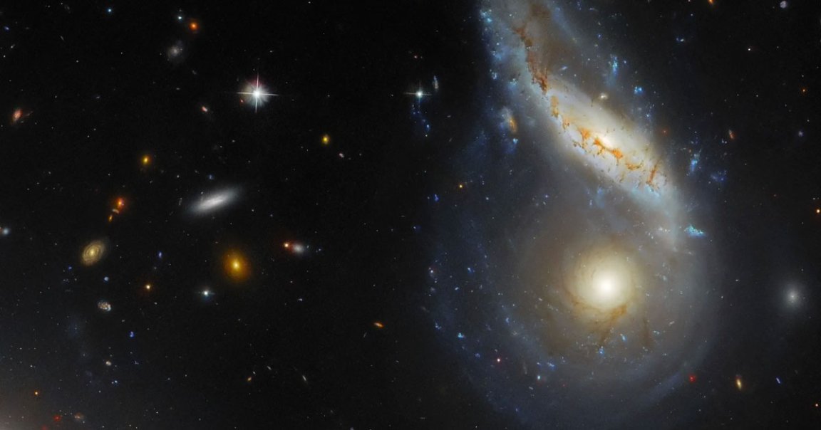 NASA's Hubble Space Telescope has snapped a glorious image of two massive galaxies in the process of colliding with each other.