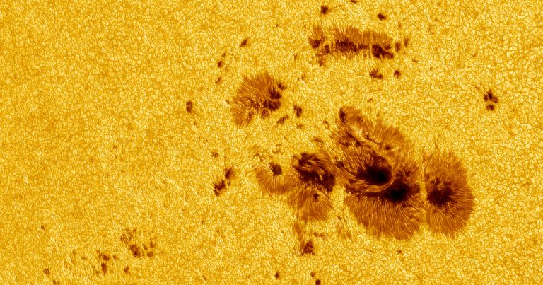 Last fall, NASA's Mars rover spotted a massive spot on the surface of the Sun — and now, that ginormous maw is looking directly at the Earth.