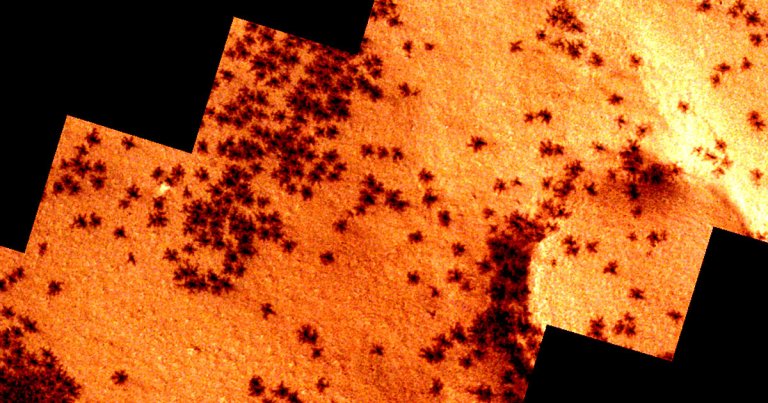 The European Space Agency's Mars Express orbiter has spotted mysterious "spiders" roaming the Red Planet's southern polar region.