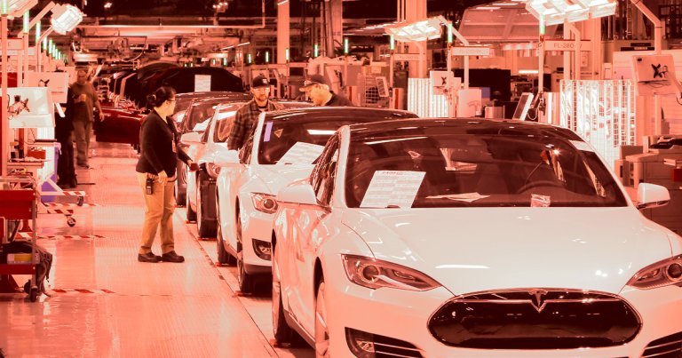Some Tesla workers didn't find out they'd been laid off until they showed up to work Monday morning and were locked out.