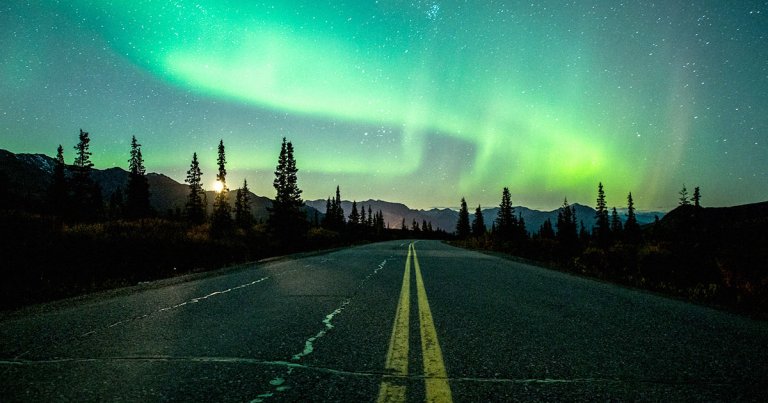 A massive solar storm is blasting the Earth's atmosphere with charged particles, resulting in auroras that will be visible across the US.