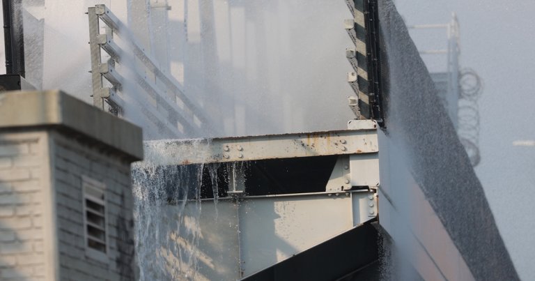 NYC's Third Avenue Bridge was got stuck turning as temperatures soared to 95 degrees Fahrenheit on Monday.