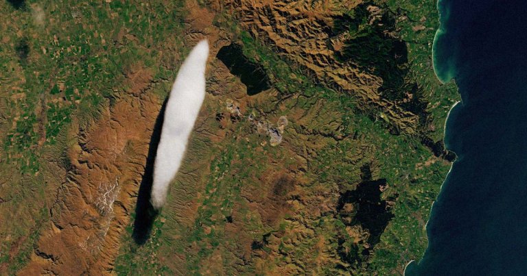 A NASA observation satellite has spotted odd UFO-shaped cloud hovering above the Otago region in southeastern New Zealand.
