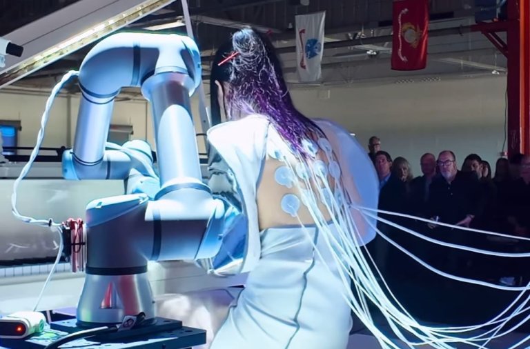Fusion Startup Conducts Strange Ceremony Involving Woman With Wires Coming Out of Her Back