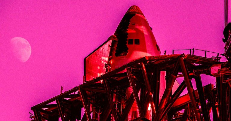 Footage recently shared by NASASpaceflight shows a massive robotic arm appearing to weld one of the company's Starship nosecones.