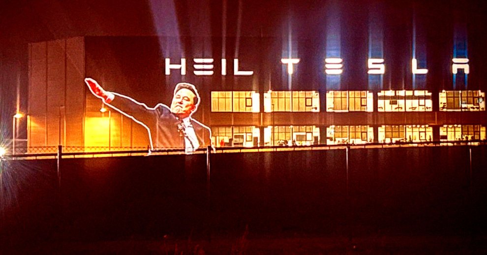 Nitler Sign Huge Image of Musk’s Nazi Salute Projected Onto German Gigafactory