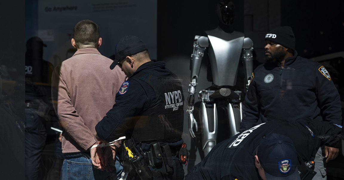 Hundreds of protestors gathered outside a Tesla dealership in Manhattan over the weekend, with some storming the building.