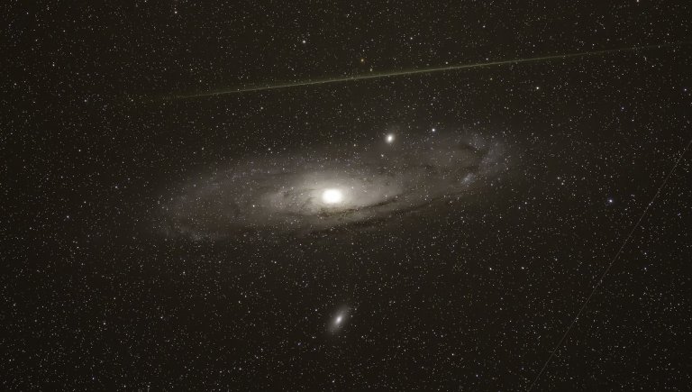 The dwarf galaxies surrounding Andromeda, the closest galaxy to our own, have an extremely strange distribution that's puzzling astronomers.