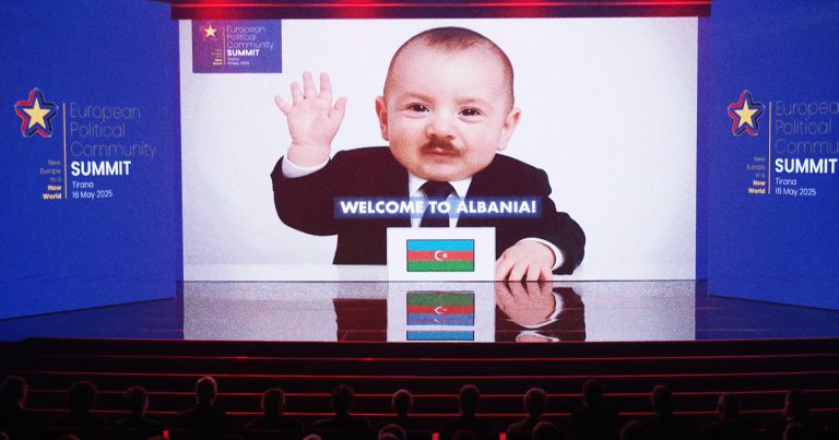 World leaders being shown baby versions of themselves at a global summit.