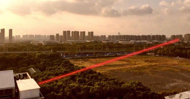Scientists say they've developed a ludicrously keen-eyed laser device that can read the text in a book from a whopping 0.85 miles away.