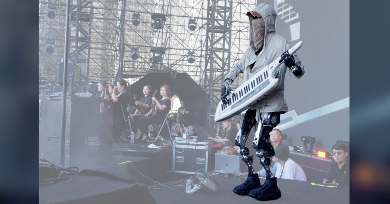 During a Chinese music festival, a humanoid robot named "Adam" grooved on the keytar while semi-disguised in a loose-fitting hoodie. 