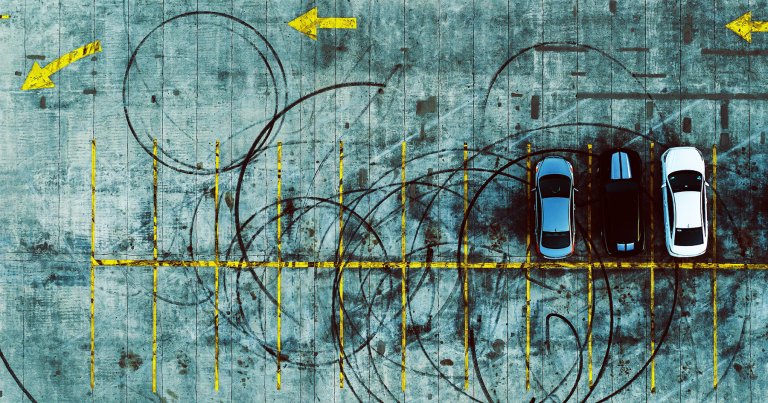 Footage shows a Tesla Robotaxi endlessly driving in circles in a parking lot that it can't figure out how to escape from.