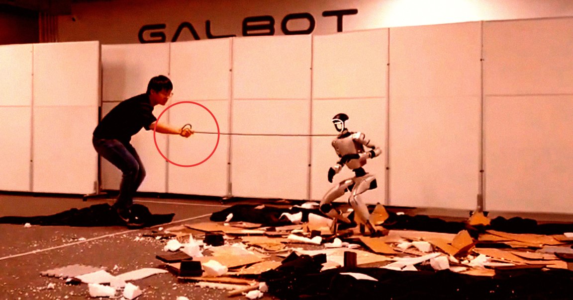A video showing a robotics engineer violently yanking a humanoid robot around by a chain wrapped around its neck is making its rounds online.