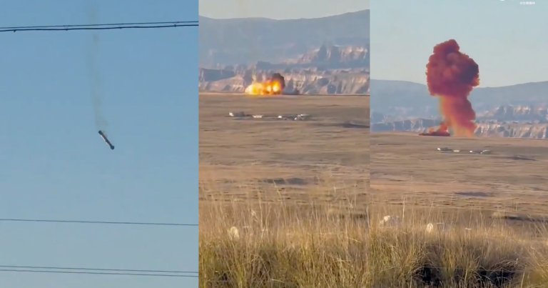 A Chinese rocket booster tumbled back down to Earth and exploded in a massive orange fireball as it impacted the ground.