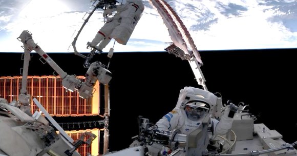 Chinese astronauts clambered outside the company's space station to inspect damage to one of its spacecraft.