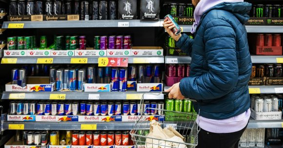 A man who admitted to drinking eight energy drinks a day has lasting numbness throughout his body due to a stroke.