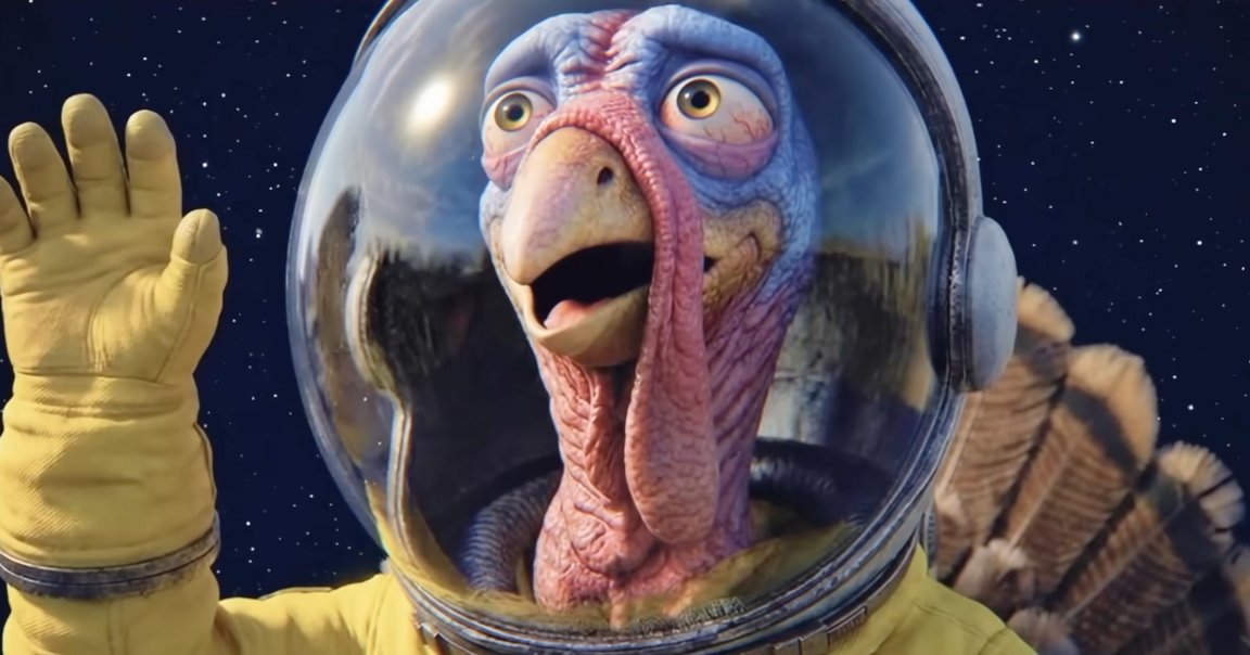 A close-up of an animated turkey wearing a yellow astronaut suit and a clear space helmet, with one gloved hand raised. The turkey has a blue and pink textured face with wide eyes and an open beak. The background shows a starry night sky.