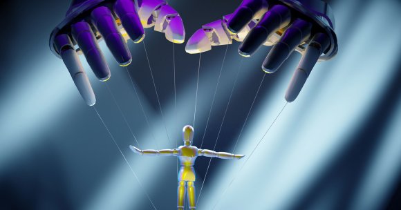 A wooden mannequin puppet is suspended by strings controlled by two large robotic hands above it. The scene is illuminated with dramatic blue and purple lighting, creating a futuristic and controlled atmosphere.