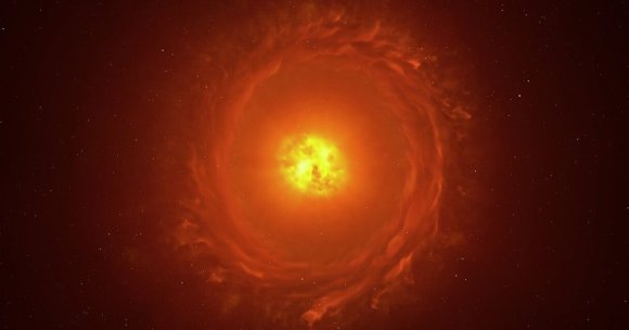 A bright, glowing orange-yellow celestial object at the center, surrounded by swirling, cloud-like formations in varying shades of orange and red, set against a dark background dotted with small white stars.