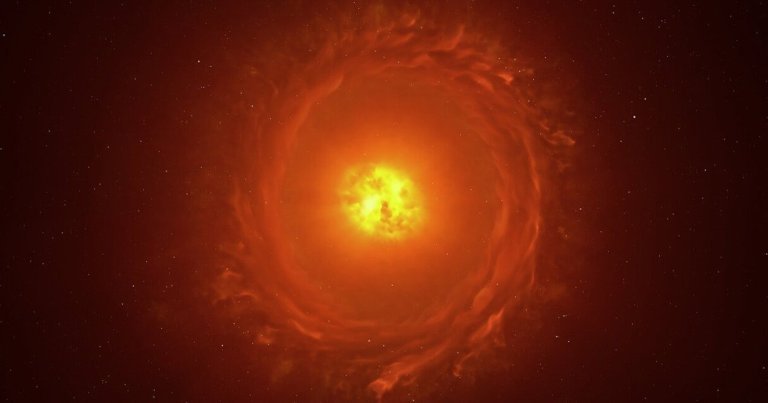 A bright, glowing orange-yellow celestial object at the center, surrounded by swirling, cloud-like formations in varying shades of orange and red, set against a dark background dotted with small white stars.