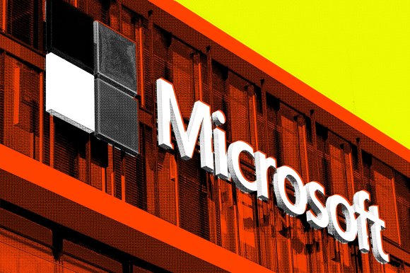 Microsoft logo on a building facade with a stylized color scheme featuring bright orange, yellow, black, and white tones. The logo consists of four square panes and the word "Microsoft" in bold white letters.