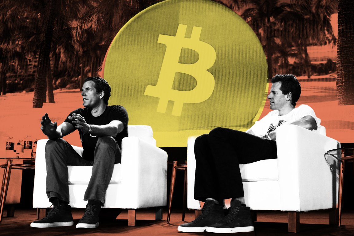 The Winklevoss twins are seated in white armchairs facing each other, engaged in conversation. The background features a large yellow Bitcoin symbol overlaid on an orange-tinted scene with palm trees. Both are dressed casually, one in a black shirt and the other in a white shirt, wearing dark pants and sneakers.