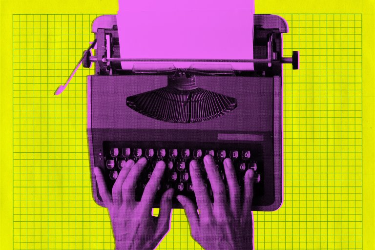 Hands typing on a vintage typewriter with a blank sheet of paper, shown from above. The image has a pop art style with the typewriter and hands in purple and the background in bright yellow with a green grid pattern.