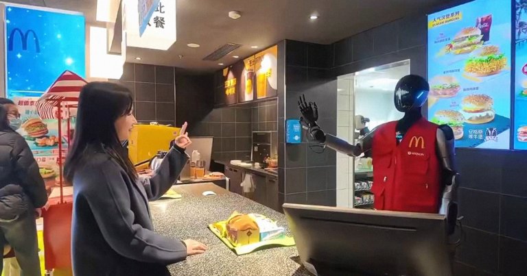 A video shows a uniformed robotic employee at a McDonald's in Shanghai, China greeting a patron while seemingly taking their order.