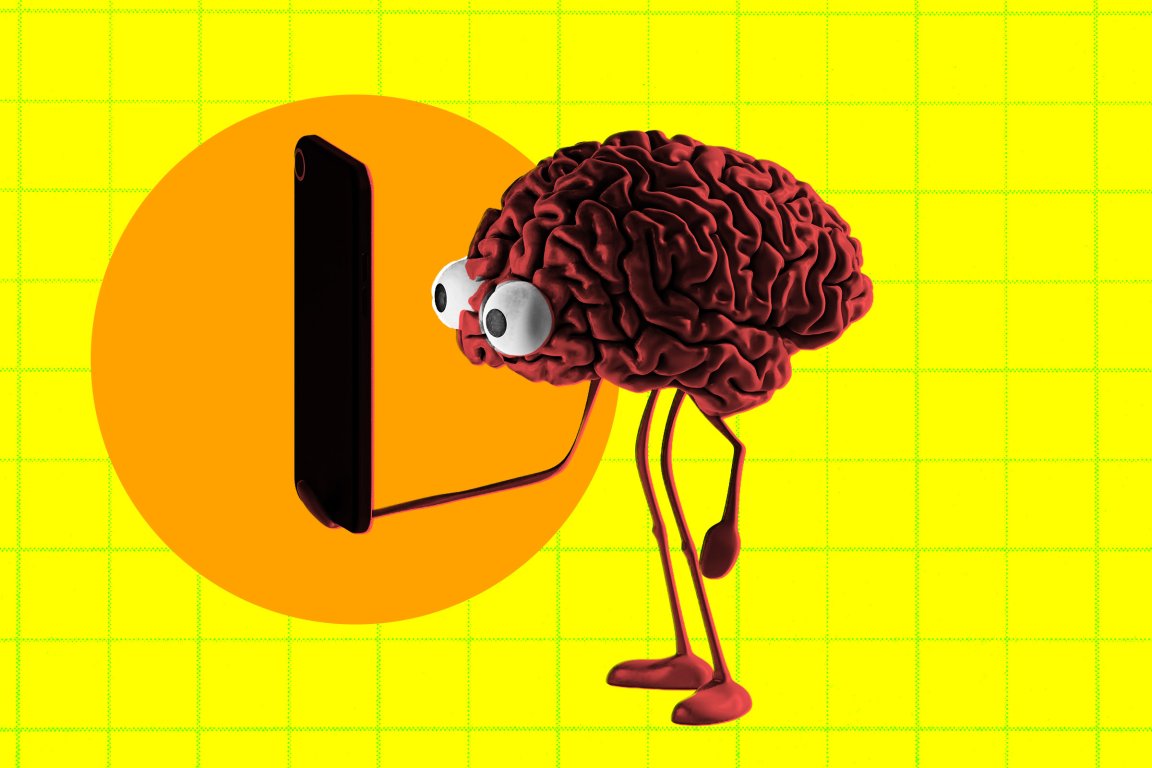 A cartoonish red brain with large, googly eyes and thin, stick-like arms and legs is looking at a smartphone held up in front of it. The background is bright yellow with a grid pattern and an orange circle behind the phone.