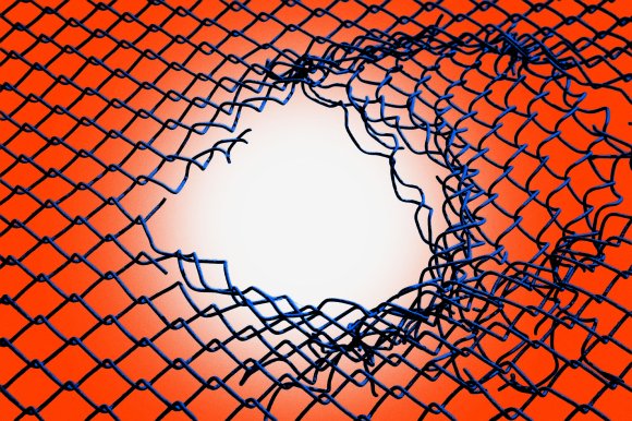 A close-up of a blue chain-link fence with a large, irregular hole in the center. The background behind the fence is a gradient of bright orange fading to white around the hole. The edges of the hole are jagged and twisted.