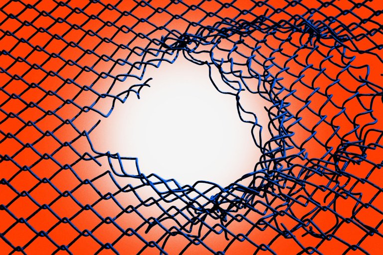 A close-up of a blue chain-link fence with a large, irregular hole in the center. The background behind the fence is a gradient of bright orange fading to white around the hole. The edges of the hole are jagged and twisted.