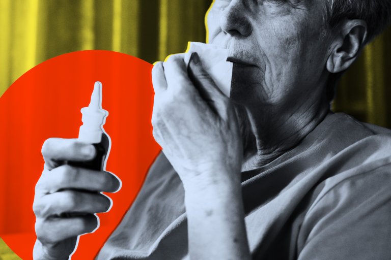 An elderly person holding a nasal spray bottle in one hand and a tissue near their nose with the other hand. The image is primarily black and white, with a yellow background and a large red circle behind the hand holding the nasal spray.