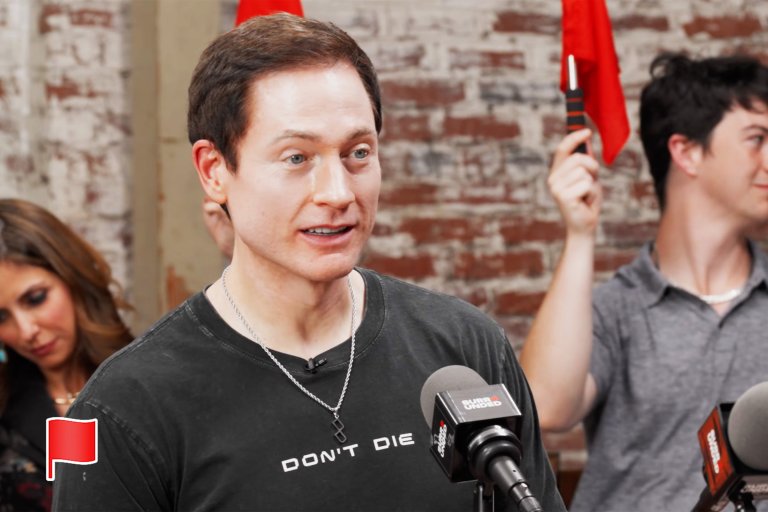 A screenshot from YouTube featuring Biohacker Bryan Johnson wearing a "Don't Die" t-shirt.
