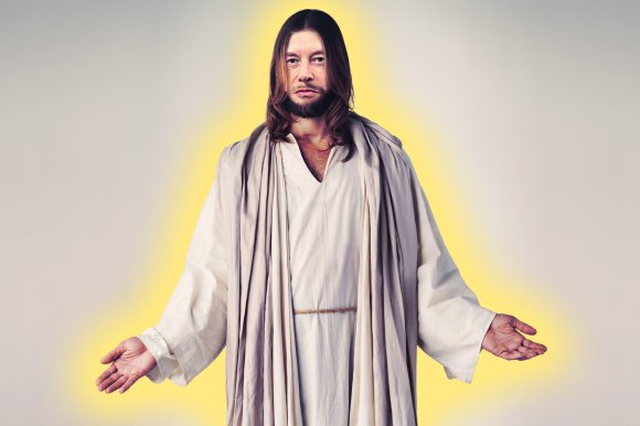 Elon Musk is shown in the garb, hair and beard commonly associated with Jesus Christ.
