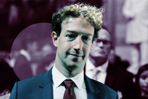 Mark Zuckerberg is shown wearing a dark suit, white shirt, and maroon tie while smiling slightly. The background is blurred with several indistinct people, one of whom is wearing glasses and a suit. The overall tone of the image has a cool, bluish tint.
