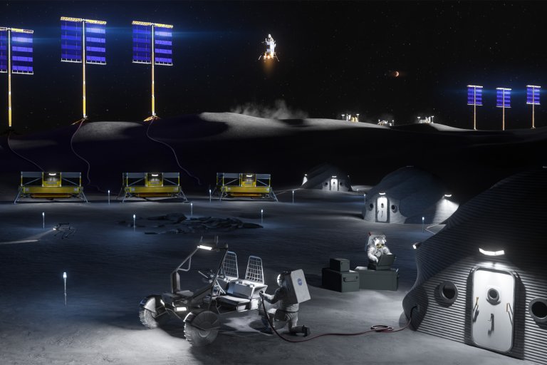 A futuristic lunar base at night with multiple dome-shaped habitats illuminated by external lights.